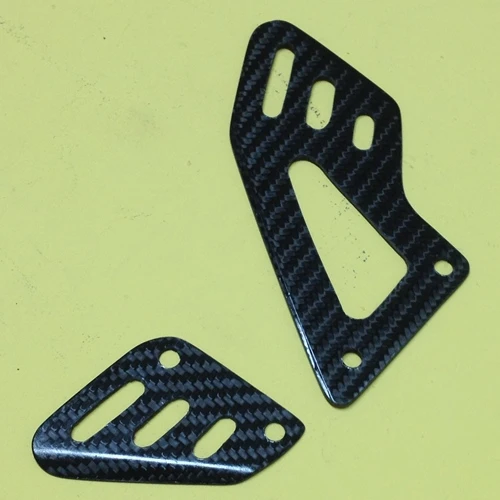 Couple of rider heel guards | glossy twill carbon